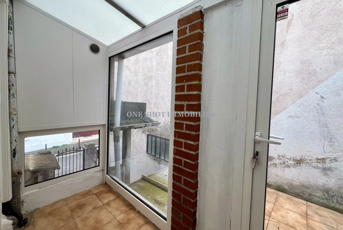 Bel appartement 3 pièces lumineux à Orléans Sud avec véranda et charme ancien 