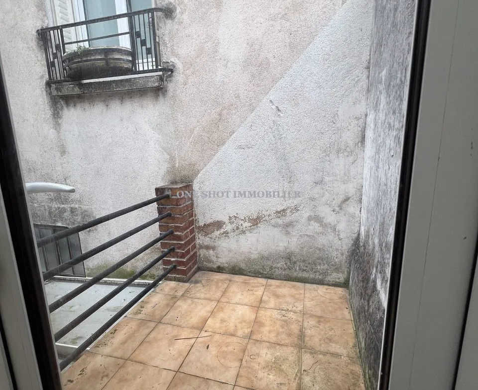 Bel appartement 3 pièces lumineux à Orléans Sud avec véranda et charme ancien 
