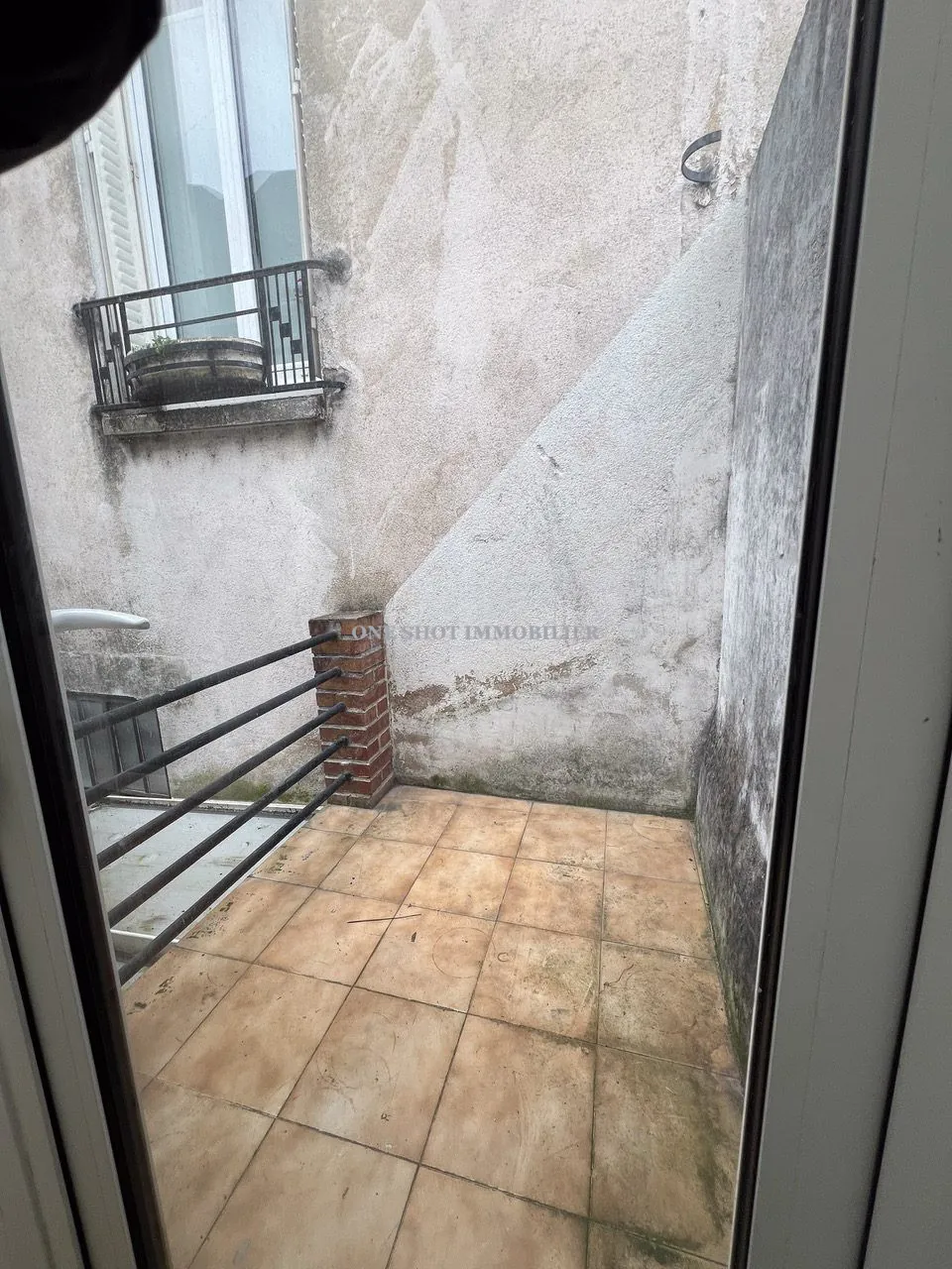 Bel appartement 3 pièces lumineux à Orléans Sud avec véranda et charme ancien 