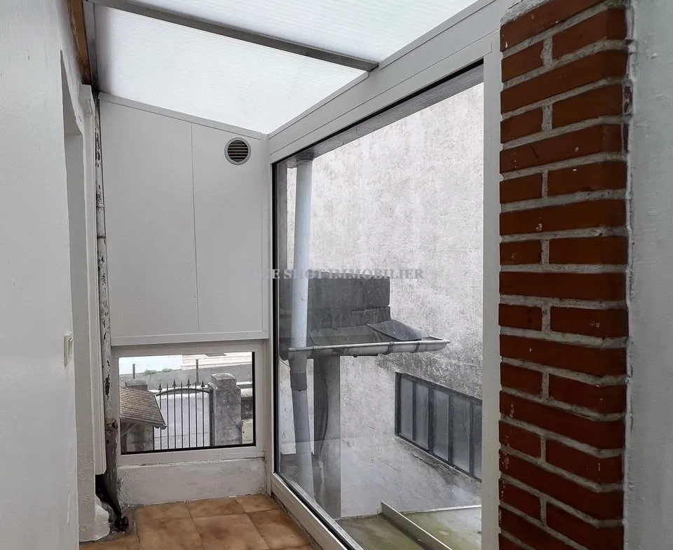 Bel appartement 3 pièces lumineux à Orléans Sud avec véranda et charme ancien 
