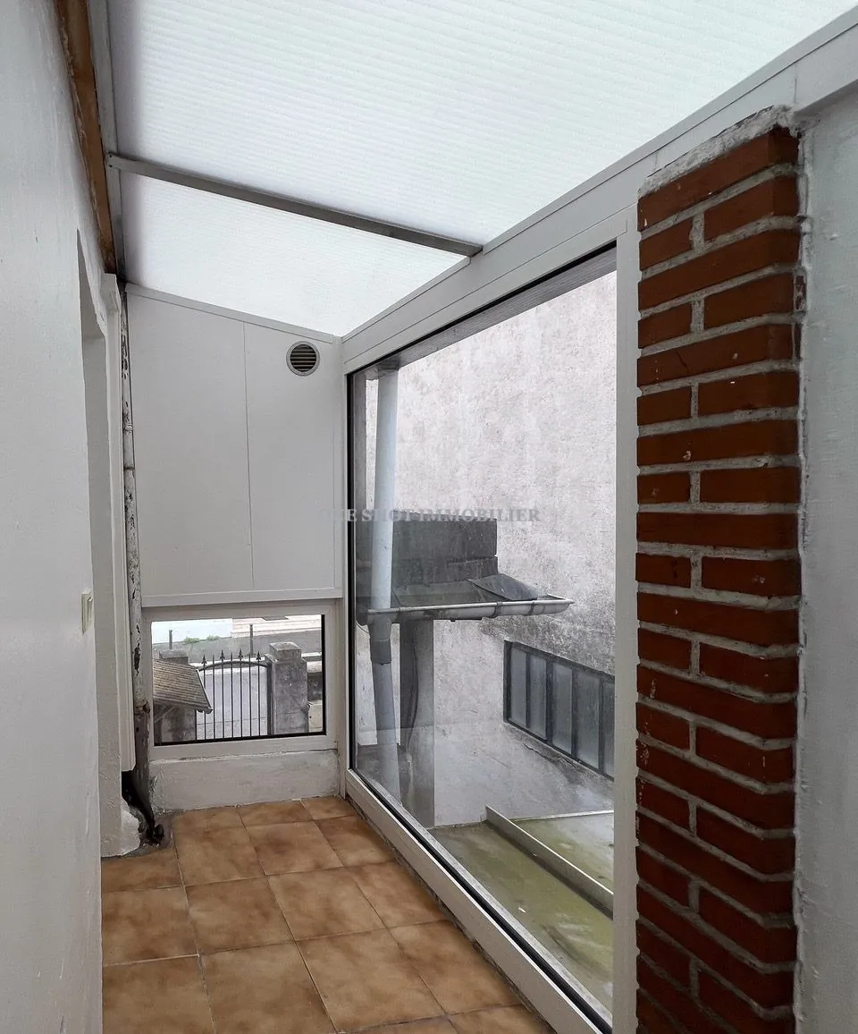 Bel appartement 3 pièces lumineux à Orléans Sud avec véranda et charme ancien 