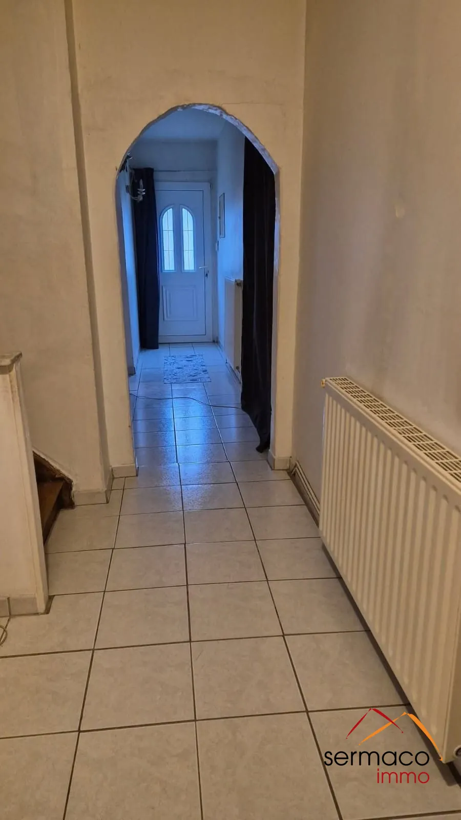 Maison à vendre à L'Hôpital avec grand terrain et potentiel de rénovation 