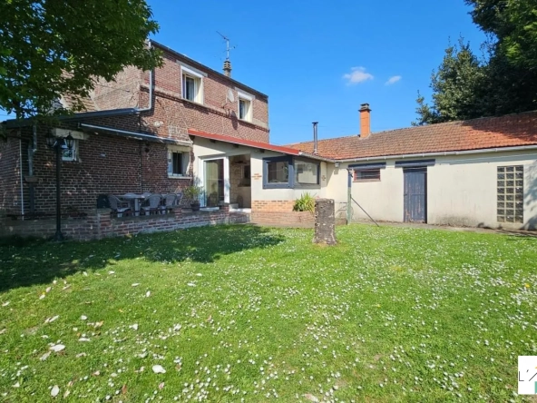 Charmante maison avec jardin, garage et 3 chambres à Baboeuf