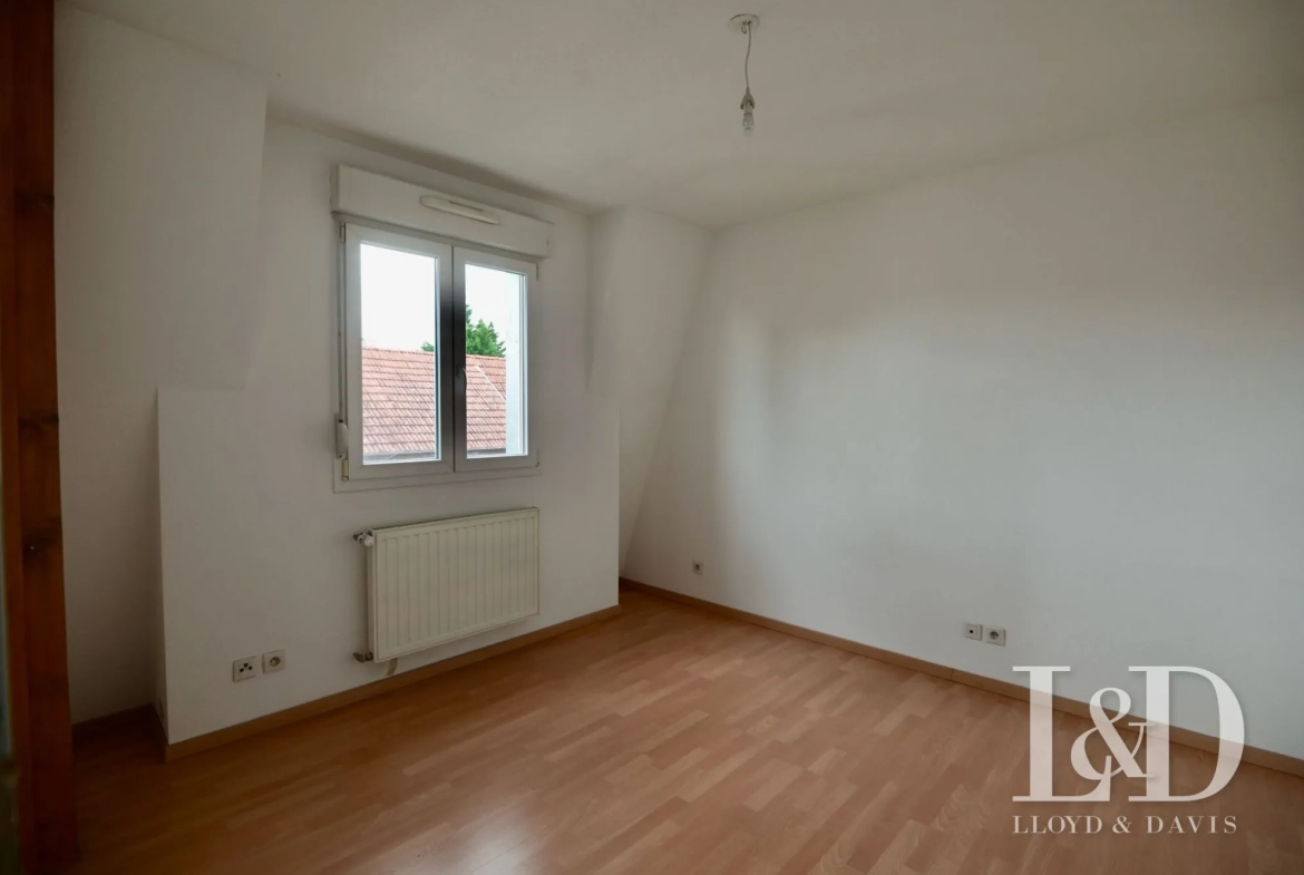 une chambre Appartement T3 à vendre avec terrasse et vue sur les Vosges à Mulhouse 