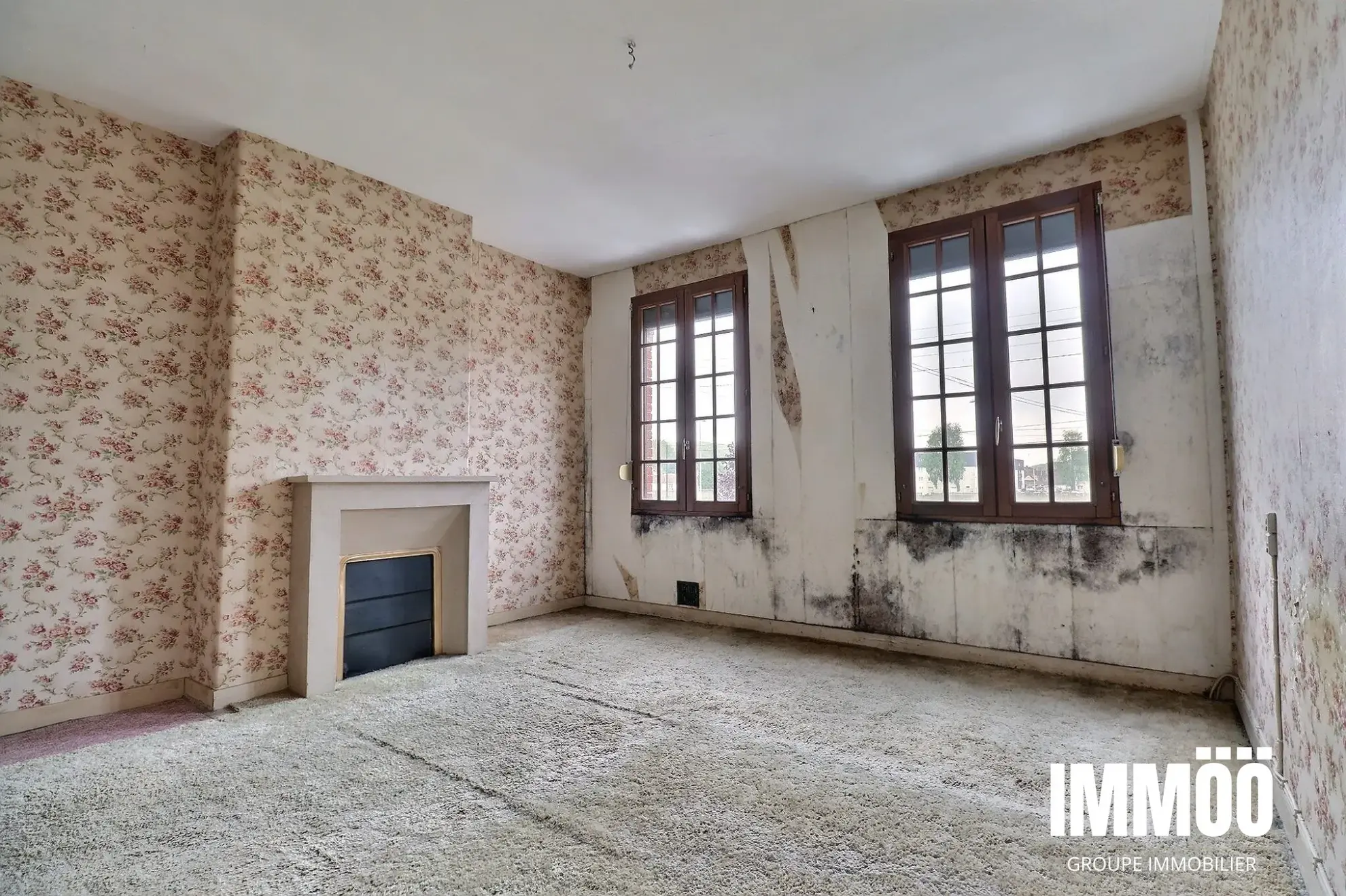 Maison de ville à rénover avec jardin à Le Houlme 