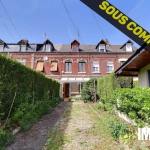 Maison de ville à rénover avec jardin à Le Houlme