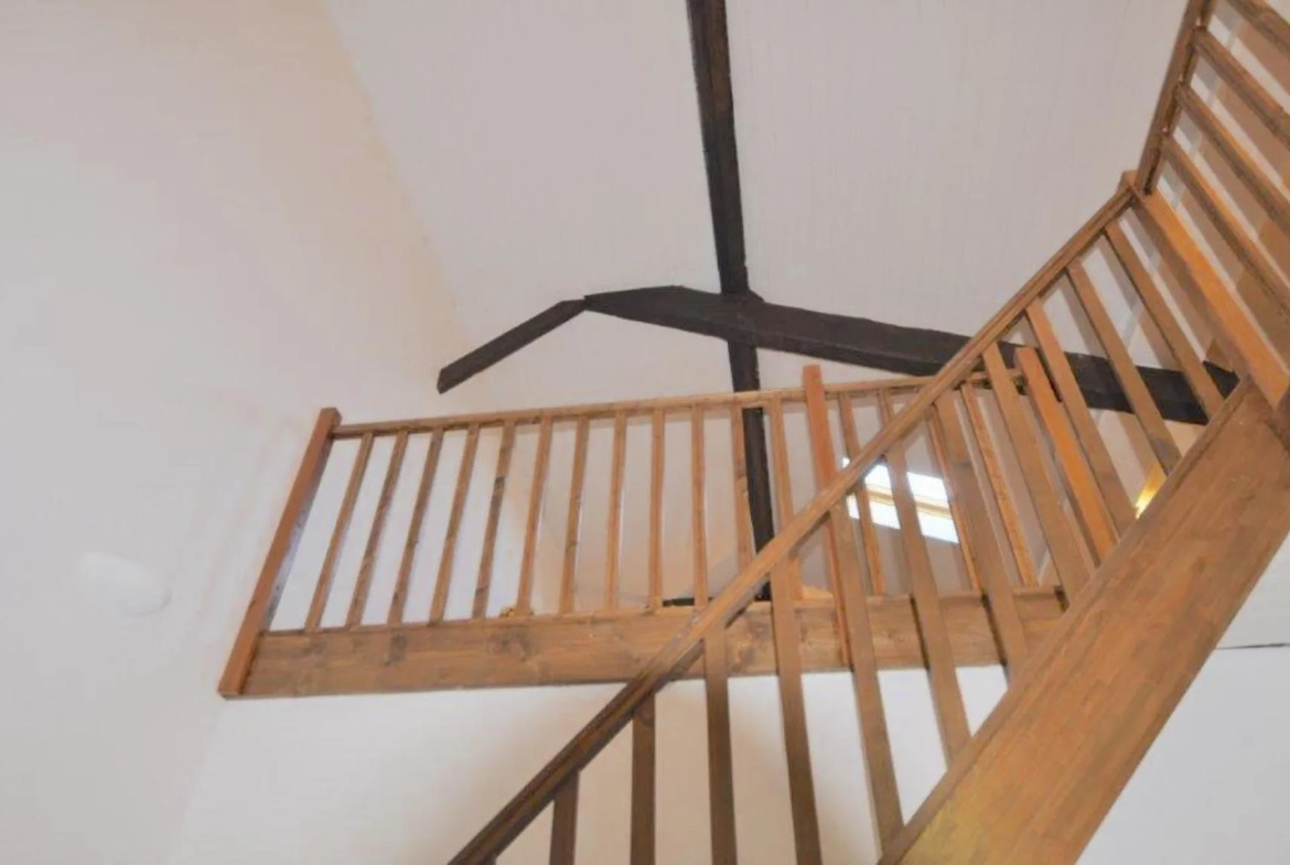 Ensemble immobilier avec jardin et deux chambres à Langoiran 