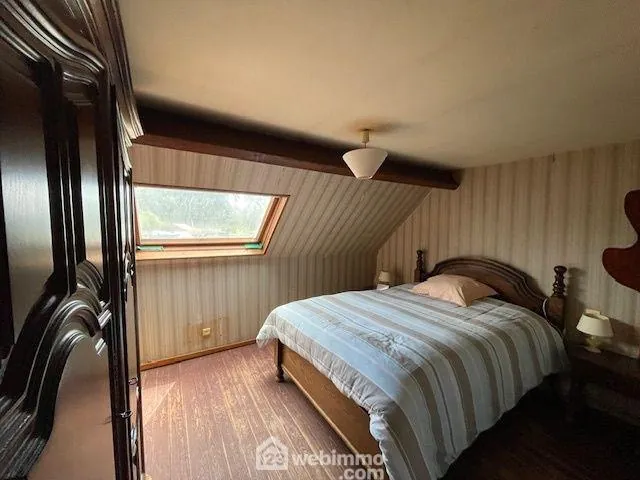 Charmante maison en pierre avec cour et vue canal dans un village tranquille 