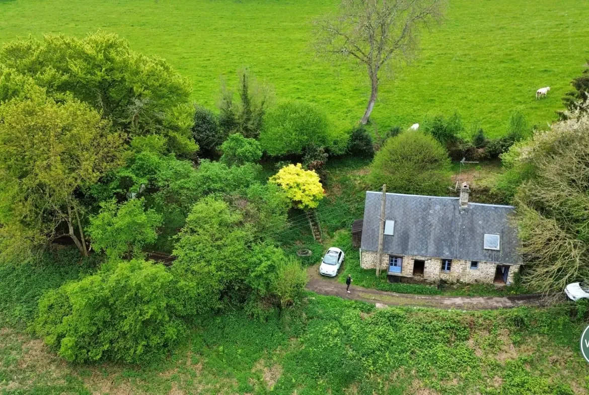 Maison à rénover à Putanges-le-Lac, cadre naturel privilégié avec terrain de 1177 m² 