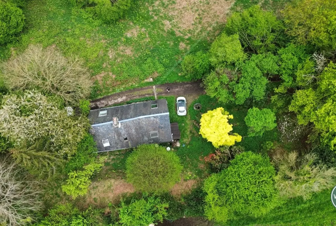 Maison à rénover à Putanges-le-Lac, cadre naturel privilégié avec terrain de 1177 m² 