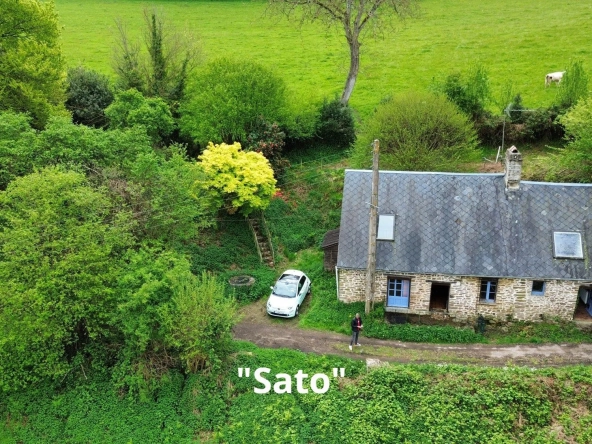 Maison à rénover à Putanges-le-Lac, cadre naturel privilégié avec terrain de 1177 m²