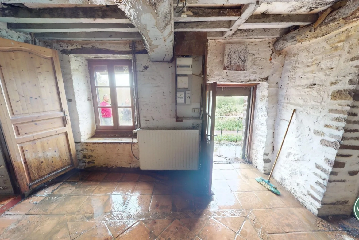 Maison à rénover à Putanges-le-Lac, cadre naturel privilégié avec terrain de 1177 m² 