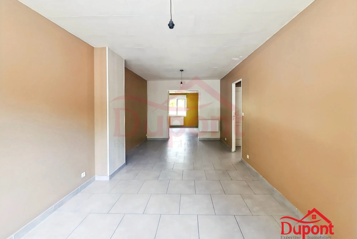 Maison semi-individuelle 3 chambres avec garage au Cateau-en-Cambrésis 