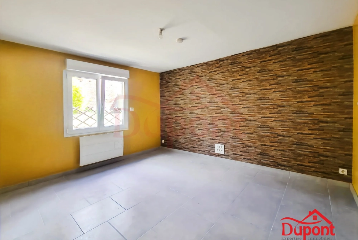 Maison semi-individuelle 3 chambres avec garage au Cateau-en-Cambrésis 