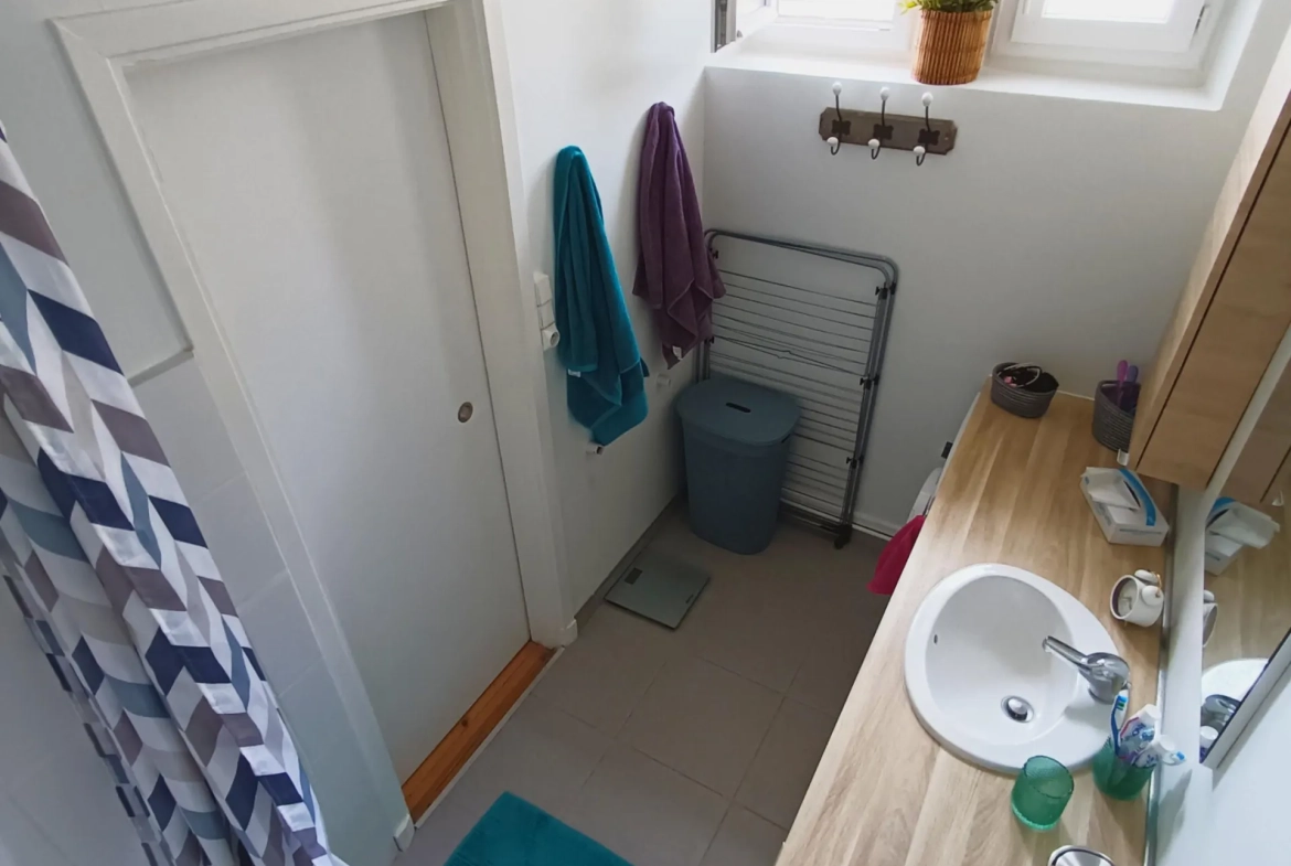 Appartement T3 de 64m² avec parking et caves en centre-ville de Bourg-de-Péage 