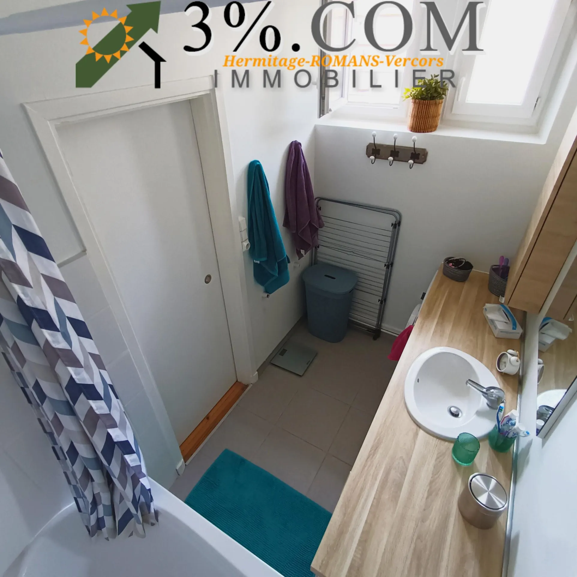 Appartement T3 de 64m² avec parking et caves en centre-ville de Bourg-de-Péage 