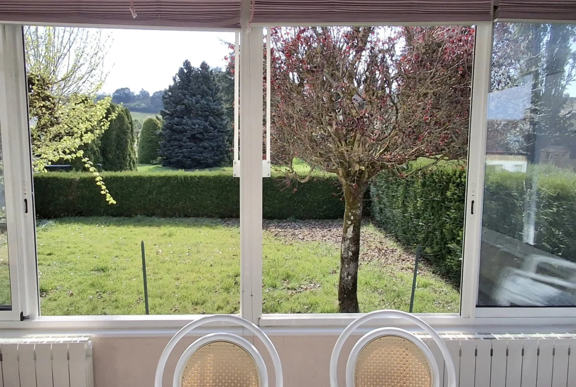 Maison ancienne à Fleury-la-Vallée avec grand terrain, garage et potentiel d'agrandissement 
