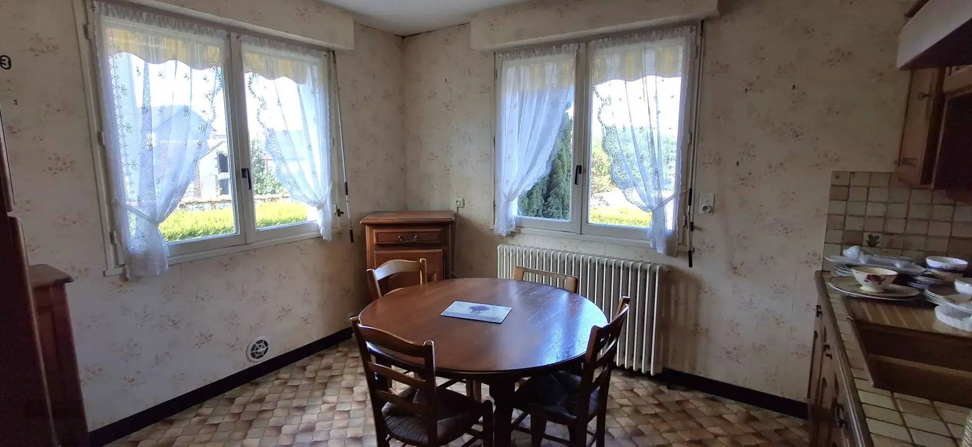 Maison ancienne à Fleury-la-Vallée avec grand terrain, garage et potentiel d'agrandissement 