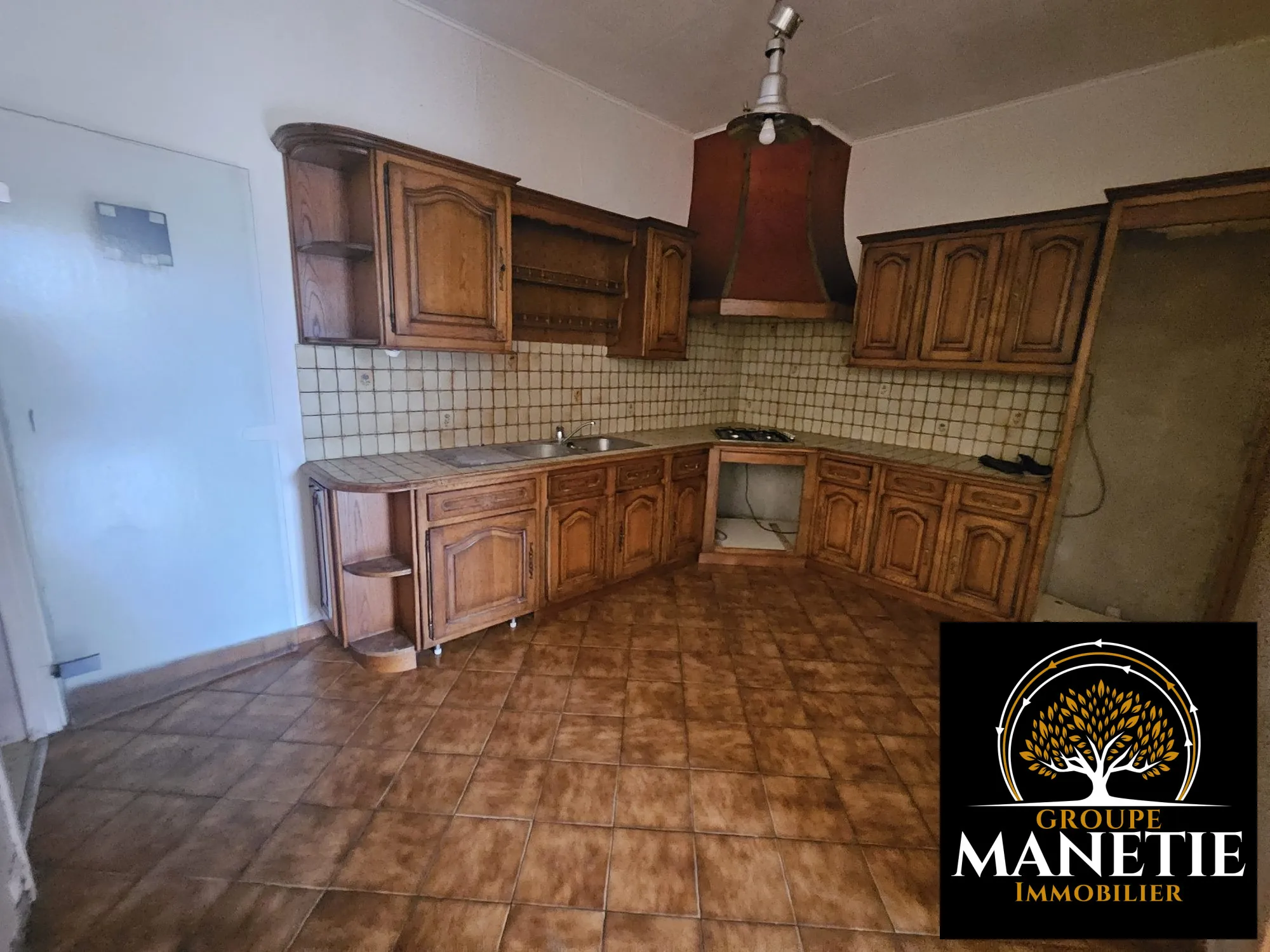 Maison à rénover à Douai avec jardin et garage - Secteur calme 