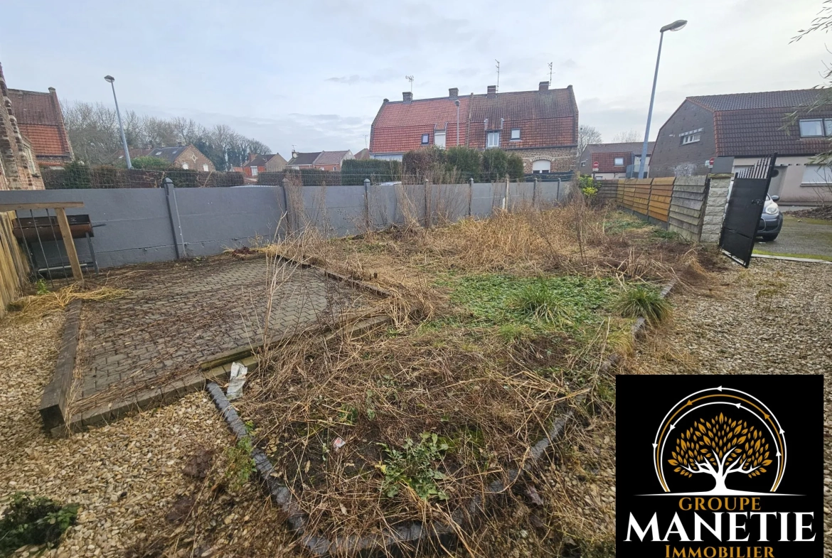 Maison à rénover à Douai avec jardin et garage - Secteur calme 