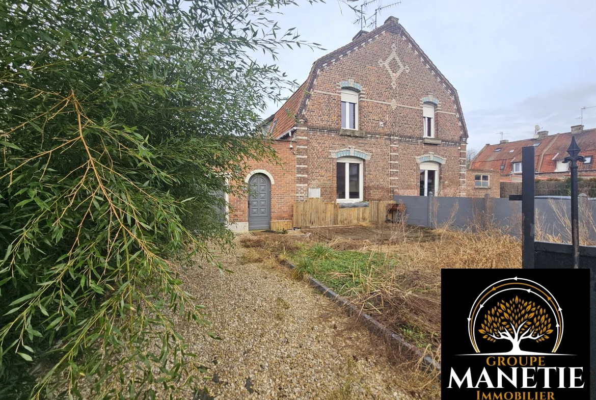 Maison à rénover à Douai avec jardin et garage - Secteur calme 