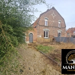 Maison à rénover à Douai avec jardin et garage - Secteur calme