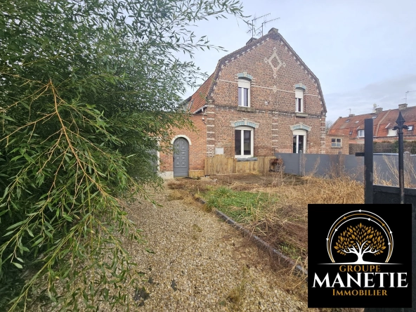 Maison à rénover à Douai avec jardin et garage - Secteur calme