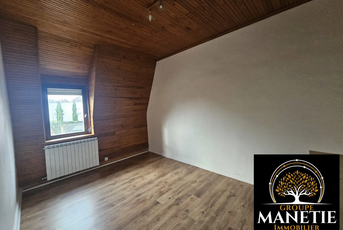 Maison à rénover à Douai avec jardin et garage - Secteur calme 