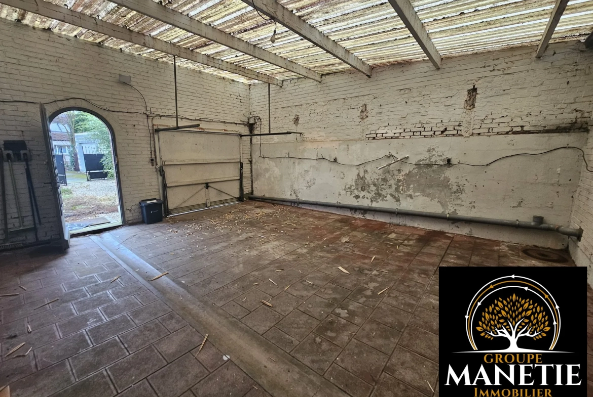 Maison à rénover à Douai avec jardin et garage - Secteur calme 