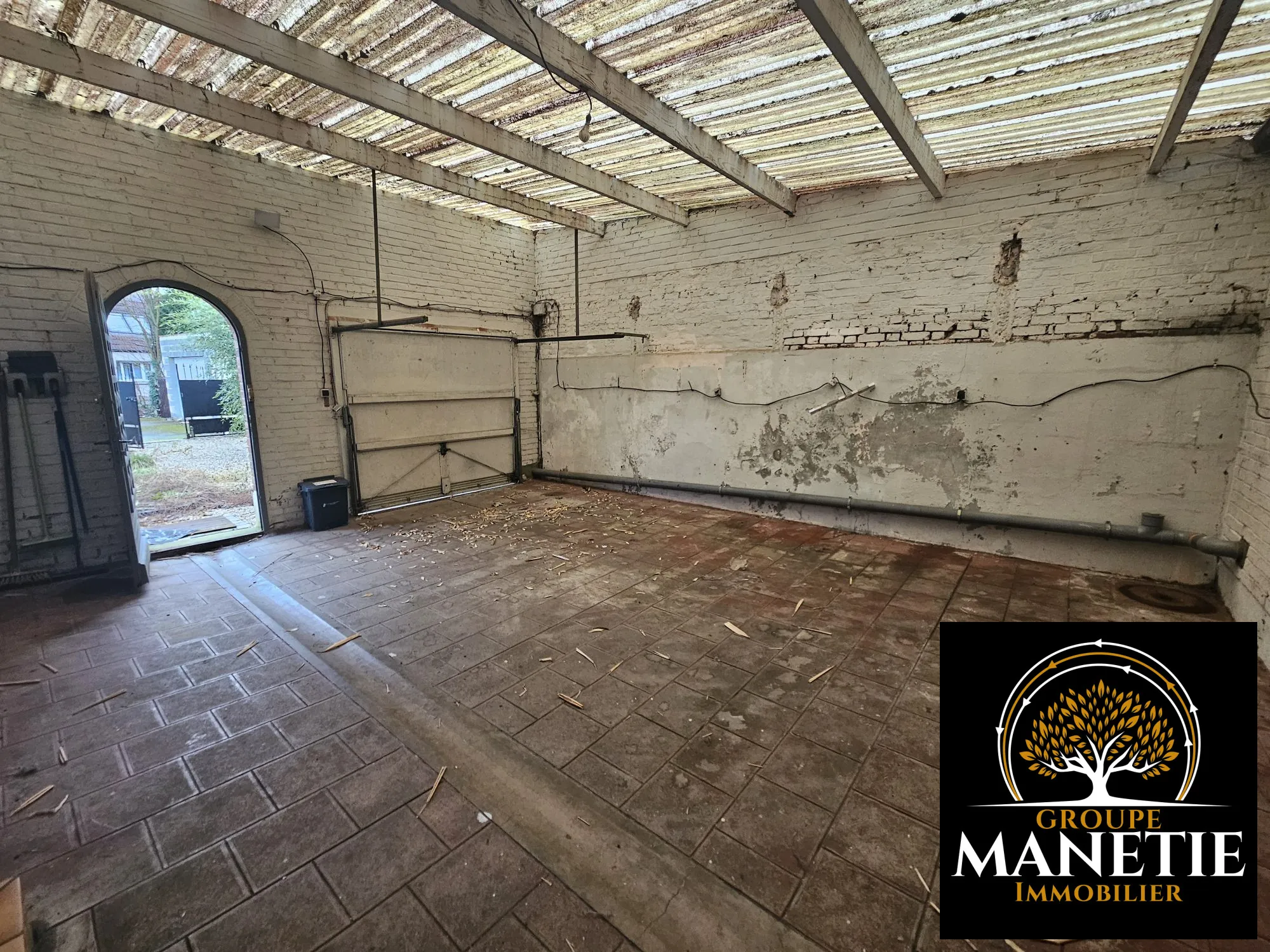 Maison à rénover à Douai avec jardin et garage - Secteur calme 