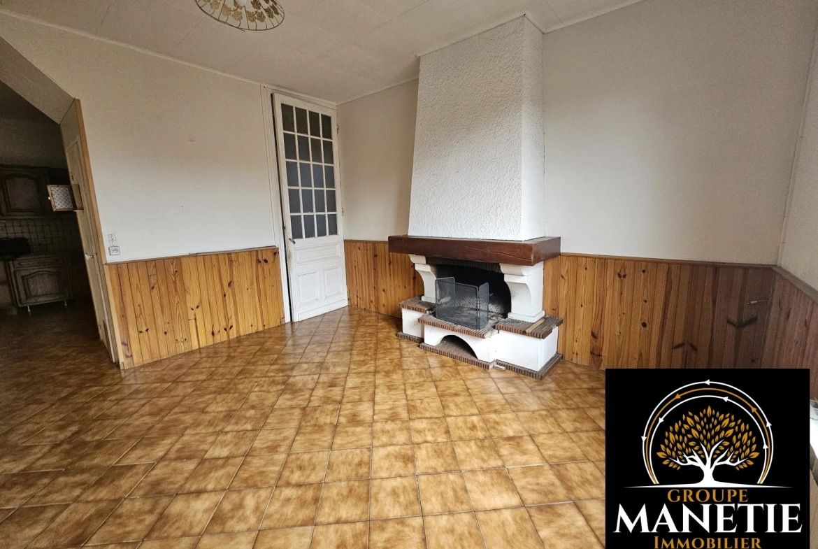Maison à rénover à Douai avec jardin et garage - Secteur calme 
