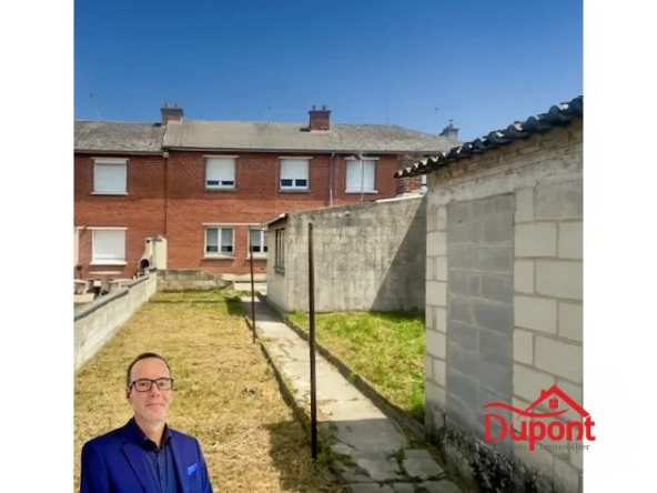 Maison à vendre à Douchy-les-Mines avec jardin, garage et cave