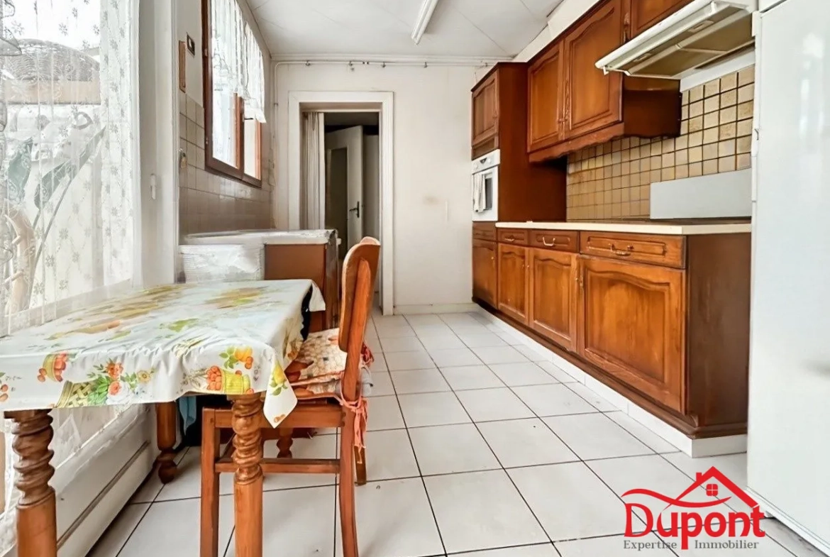 Maison individuelle à Valenciennes avec jardin et garage - Opportunité à saisir 