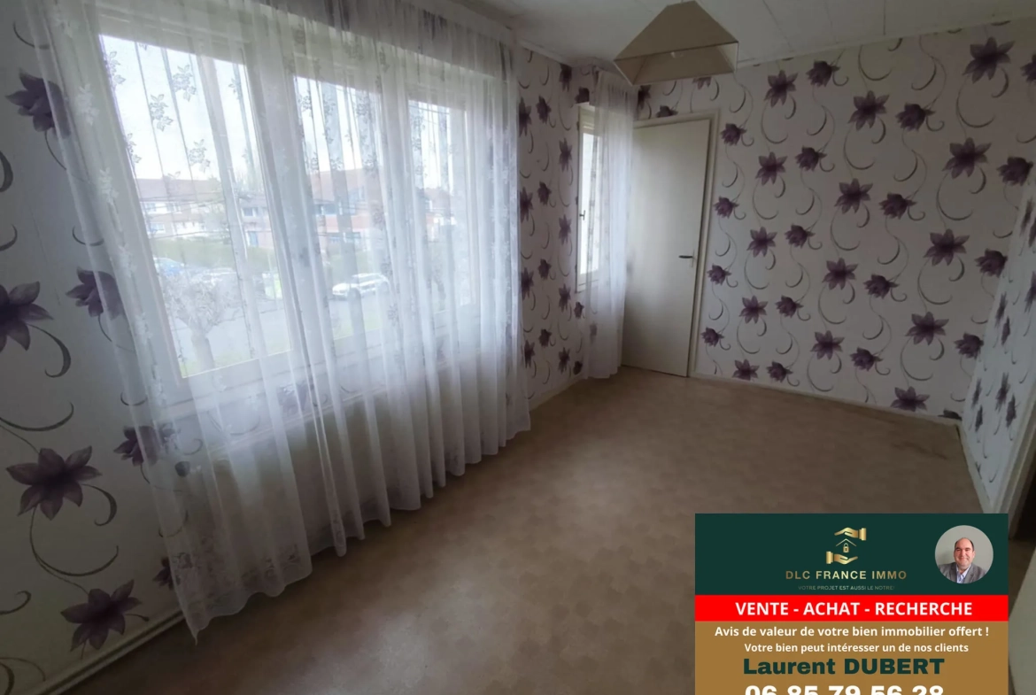 Maison semi-individuelle à vendre à Aulnoye-Aymeries - 3 chambres, garage et terrain de 723 m² 