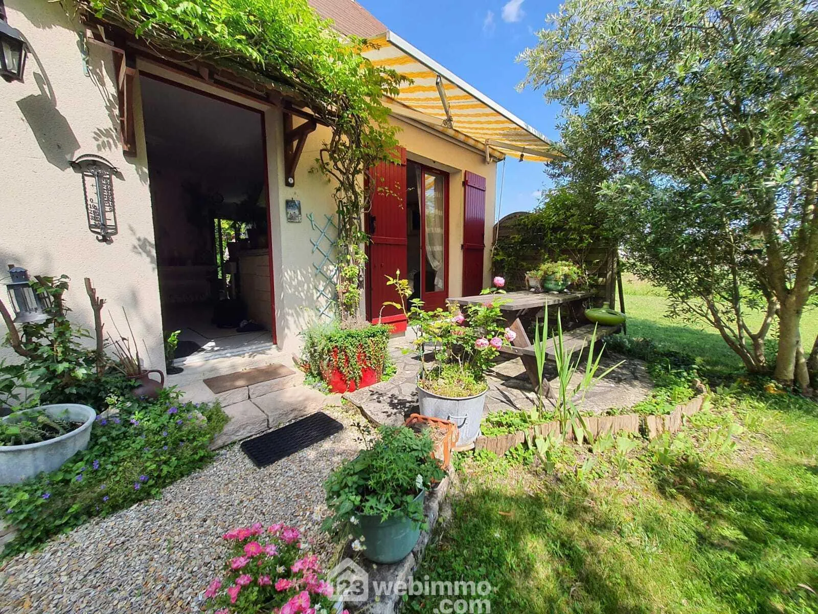 Maison à Écuelles de 116 m² avec terrasse, garage et 4 chambres 