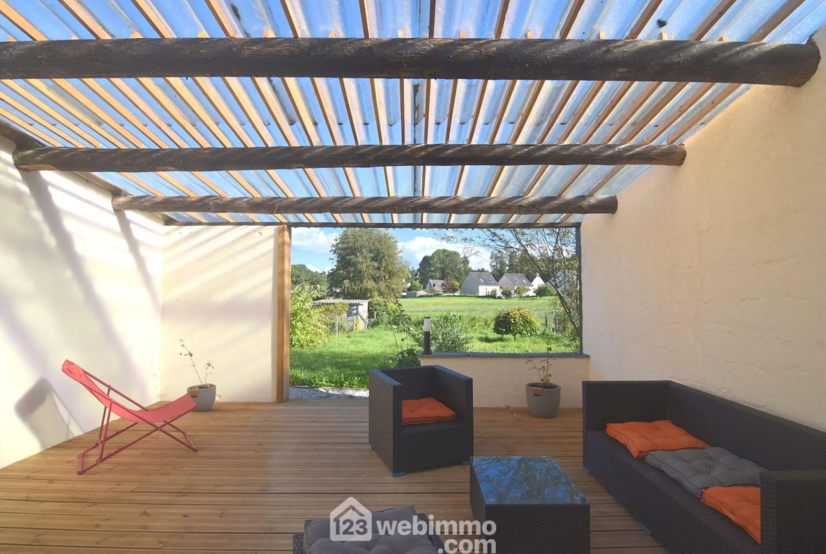 Maison de caractère de 73 m² à Plounévez-Quintin avec dépendance et jardin 