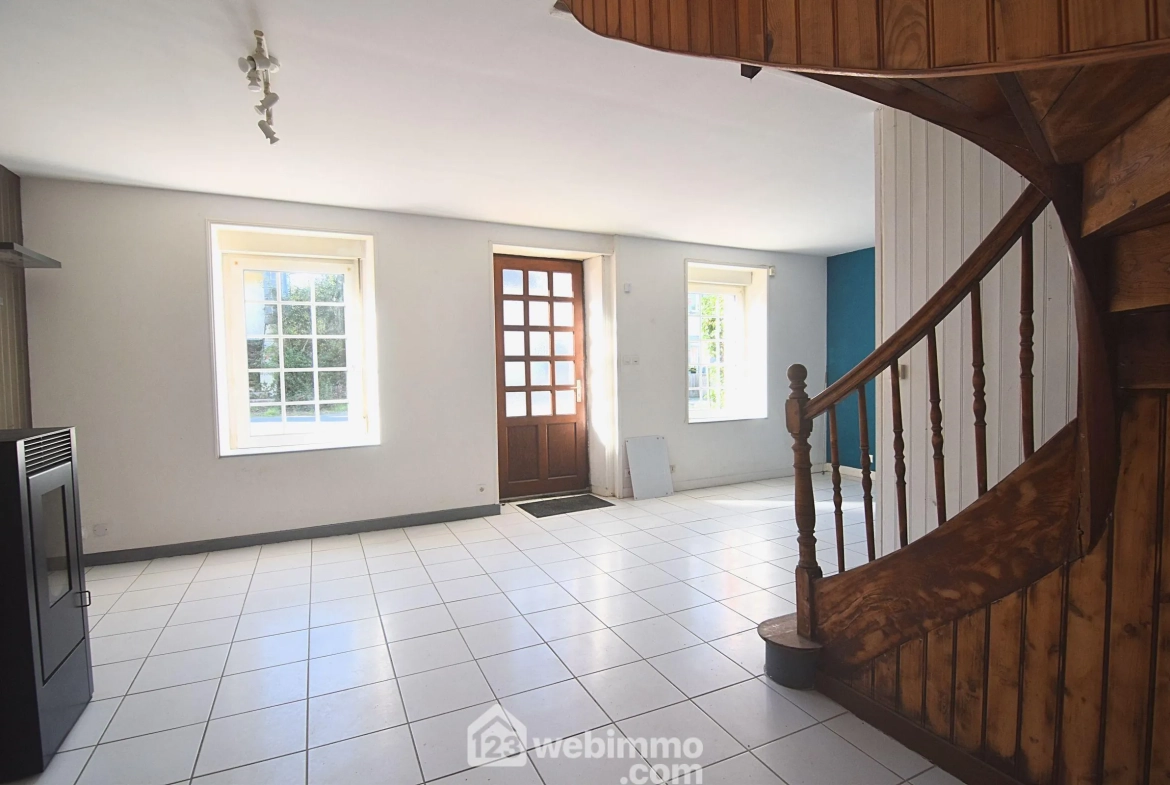 Maison de caractère de 73 m² à Plounévez-Quintin avec dépendance et jardin 