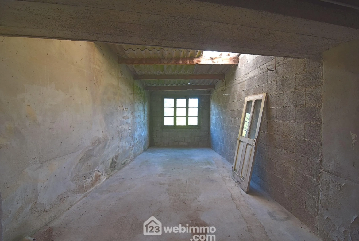 Maison de caractère de 73 m² à Plounévez-Quintin avec dépendance et jardin 