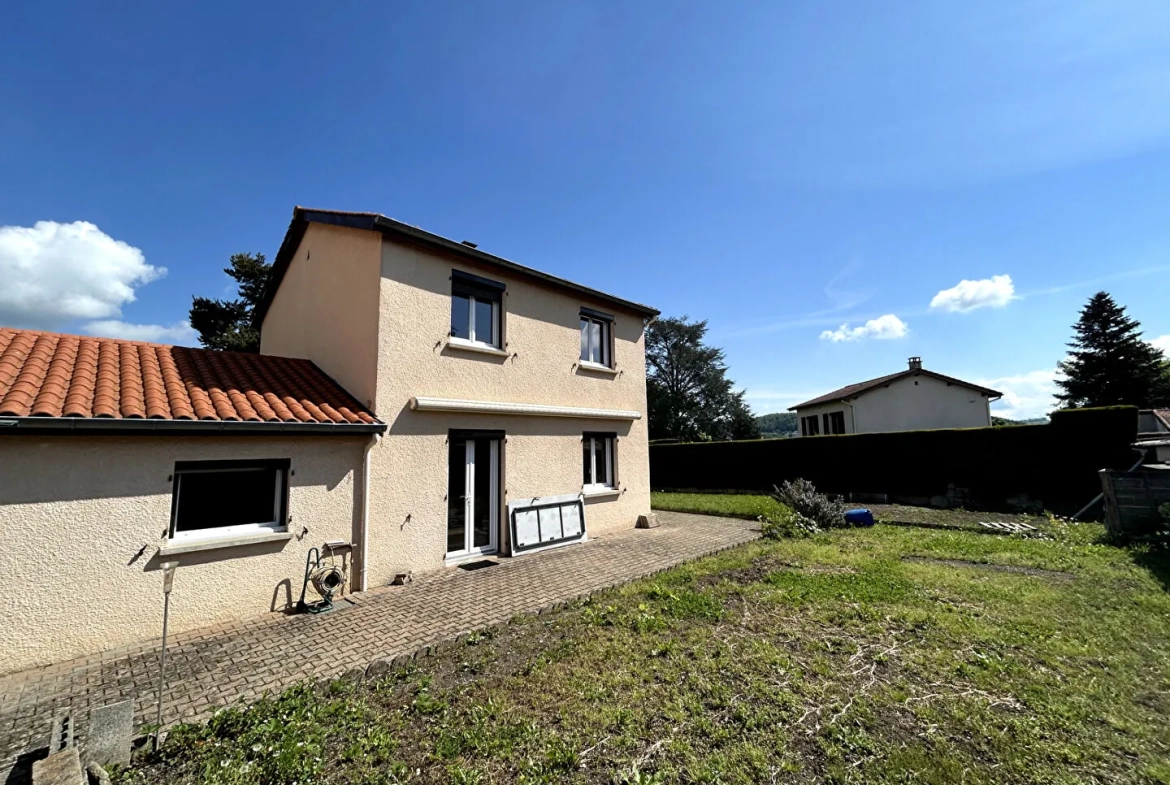 Maison jumelée à Roche-la-Molière avec jardin, garage et panneaux solaires 