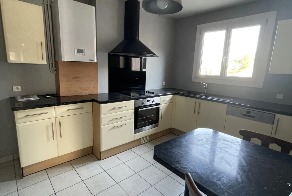 Appartement 3 pièces à Épinal avec balcon et vue dégagée - Vente immobilière 