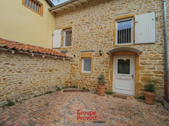 Maison de village rénovée en pierre avec jardin au Bois d'Oingt