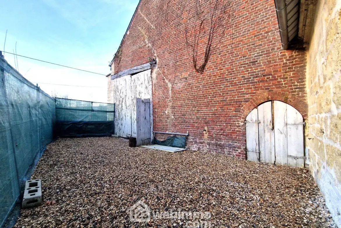 Grande grange à rénover de 100 m² à Crêpy - Opportunité rare 