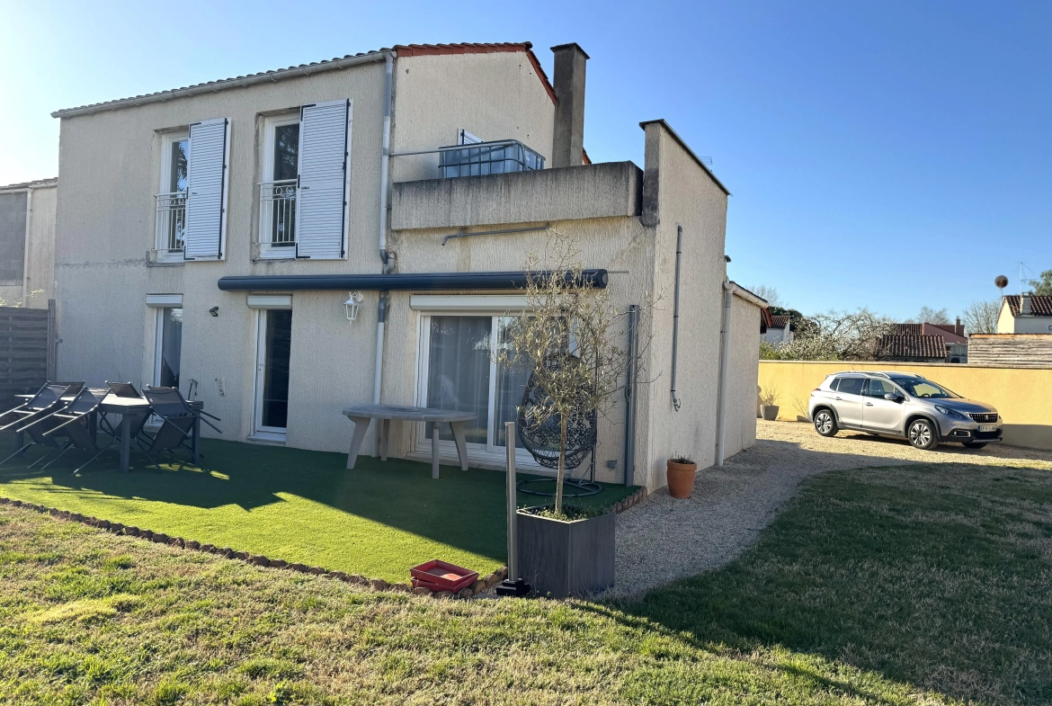 Maison mitoyenne à Mably de 100 m² avec terrasse et terrain de 576 m² 