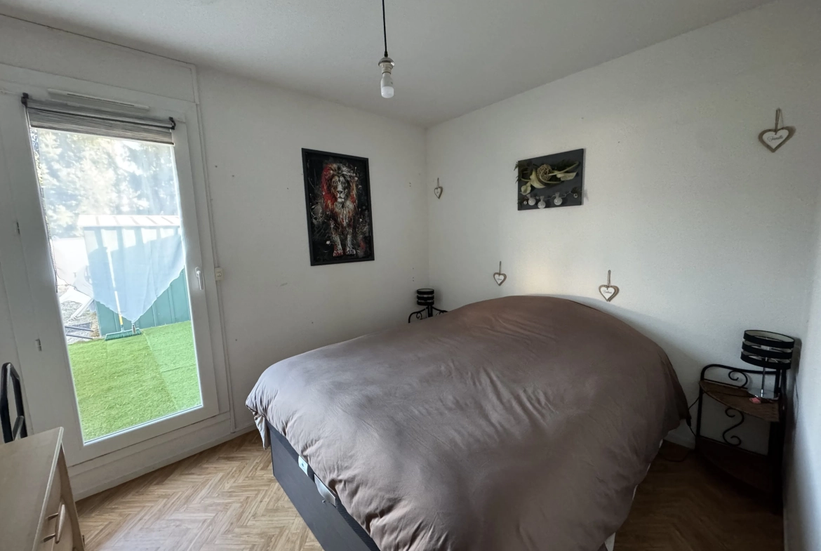Maison mitoyenne à Mably de 100 m² avec terrasse et terrain de 576 m² 
