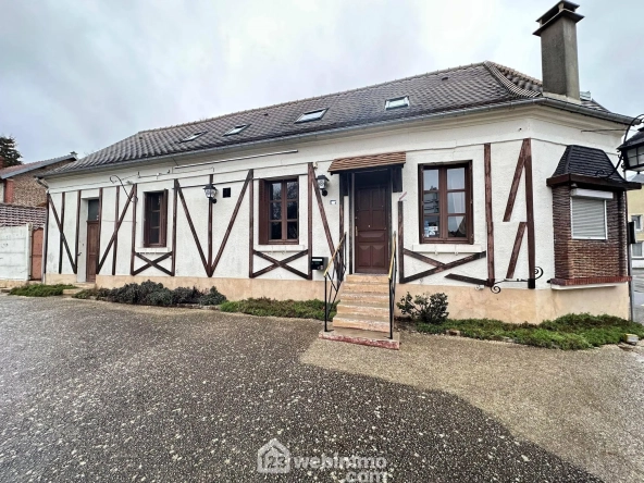 Ancienne propriété commerciale de 205 m² à Bruyères-et-Montbérault avec jardin et garage