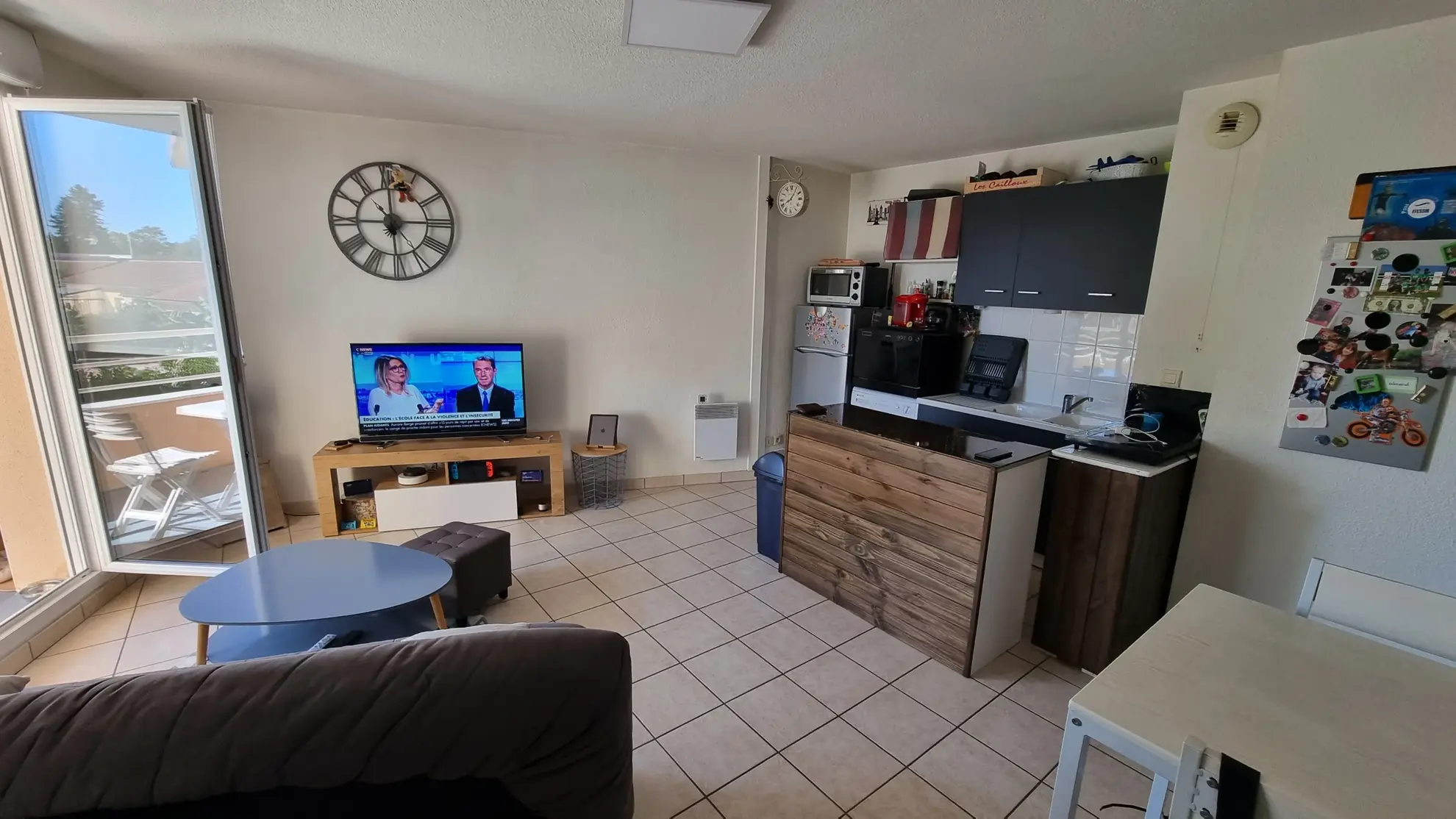 Vente d'un appartement T3 loué à Villerest avec parking et balcon 