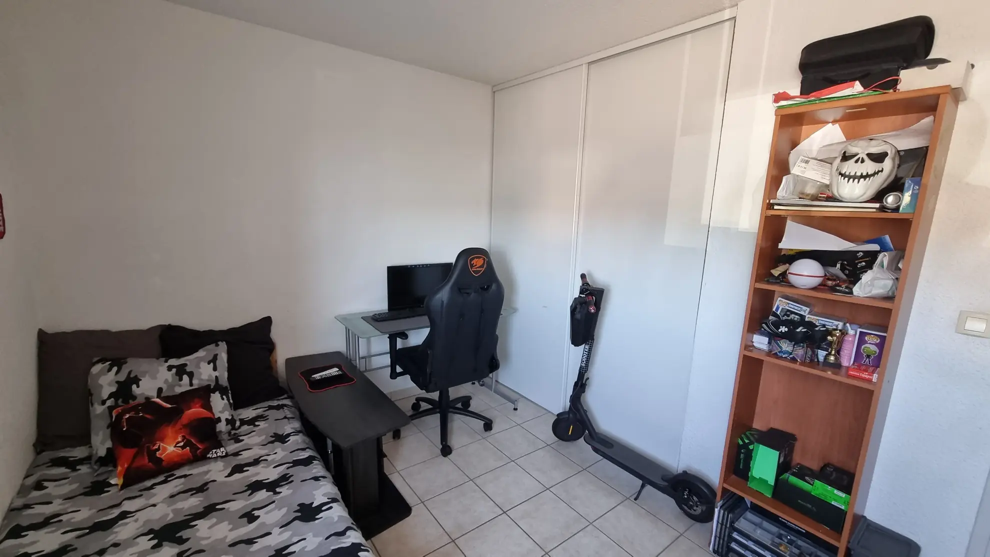 Vente d'un appartement T3 loué à Villerest avec parking et balcon 