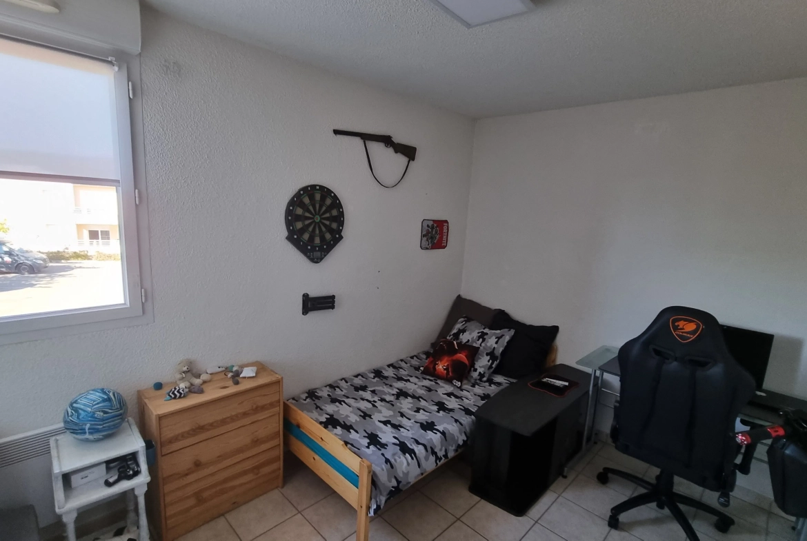 Vente d'un appartement T3 loué à Villerest avec parking et balcon 