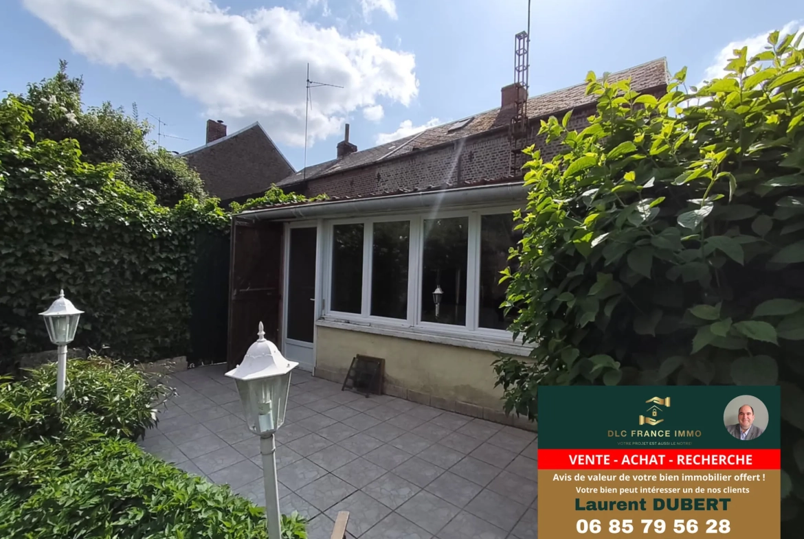 Maison à vendre à Rousies avec jardin et garage - 3 chambres 