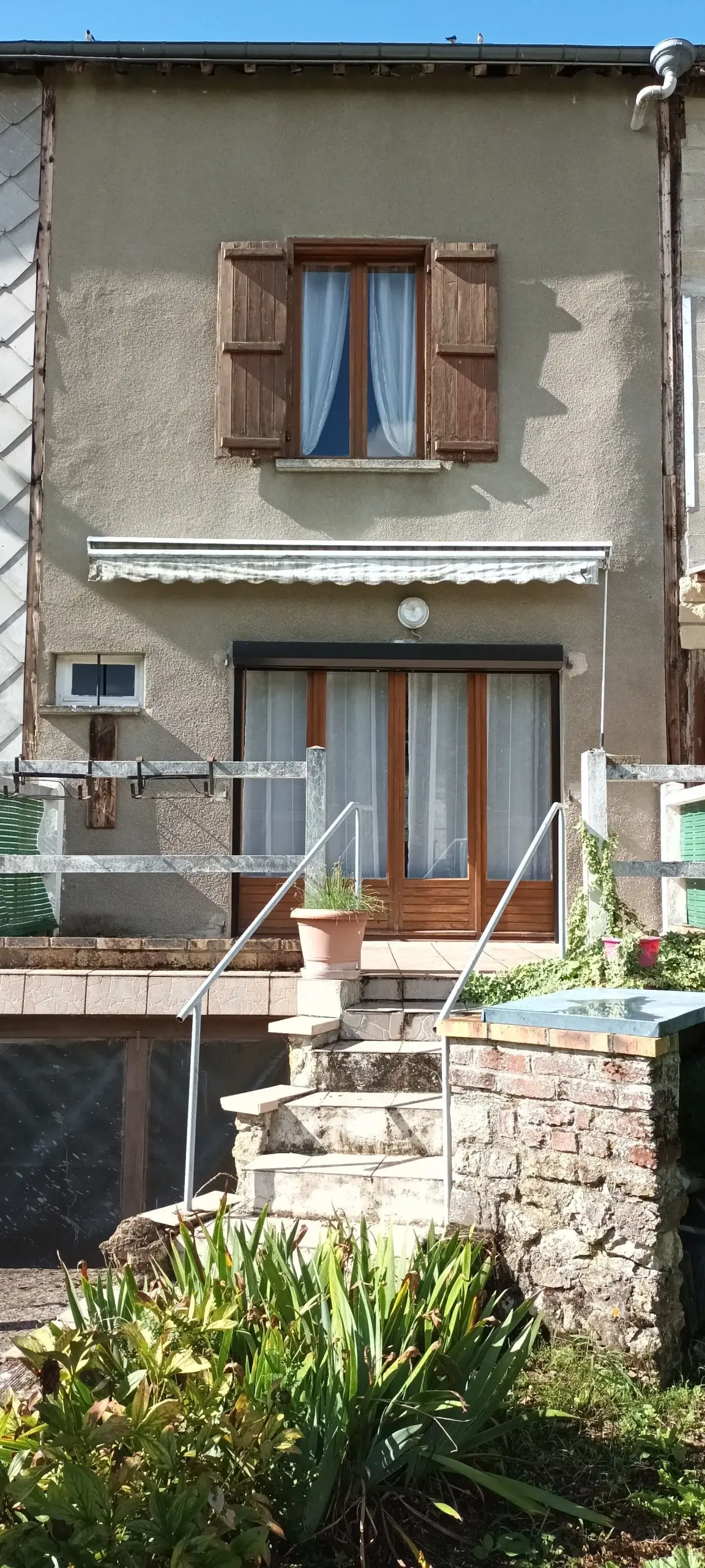 Maison à vendre à Novion-Porcien avec jardin et potentiel d'aménagement 